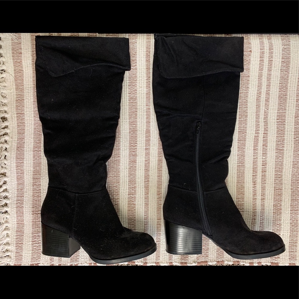 Tall black heeled boots